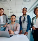 1200px-happy-multiracial-business-team-working-in-the-off-2024-12-13-18-35-52-utc