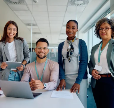 1200px-happy-multiracial-business-team-working-in-the-off-2024-12-13-18-35-52-utc